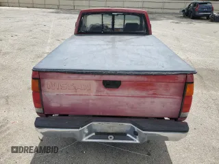 1986 Nissan Hardbody E z VIN JN6ND11SXGW022401, wystawiony jako Copart lot #51545335 z przebiegiem 187 680 mil mil oraz Czysty tytuł • Clean title. Historia ofert i sprzedaży dostępna na DreamBid. Obrazek 10.