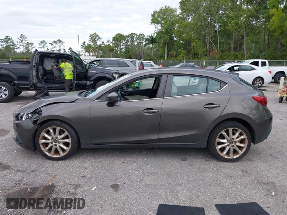 2015 Mazda 3 S Grand Touring with VIN JM1BM1M35F1264244, listed as a IAAI auction lot 41674683 with 119,684 mi miles and . Bid and sale history available at DreamBid. Image 14.
