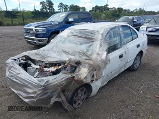 2004 Hyundai Accent GL z VIN KMHCG45C24U559935, wystawiony jako IAAI lot #40487927 z przebiegiem Nie podano mil oraz . Historia ofert i sprzedaży dostępna na DreamBid. Obrazek 2.