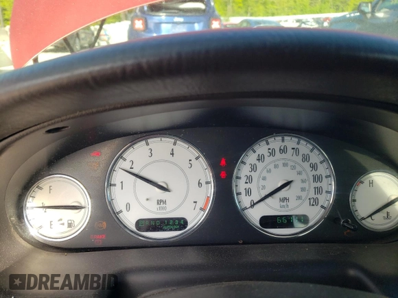 2000 Chrysler 300M M z VIN 2C3HE66G1YH430420, wystawiony jako Copart lot #57645995 z przebiegiem 66 111 mil mil oraz Szkoda całkowita • Salvage title. Historia ofert i sprzedaży dostępna na DreamBid. Obrazek 9.