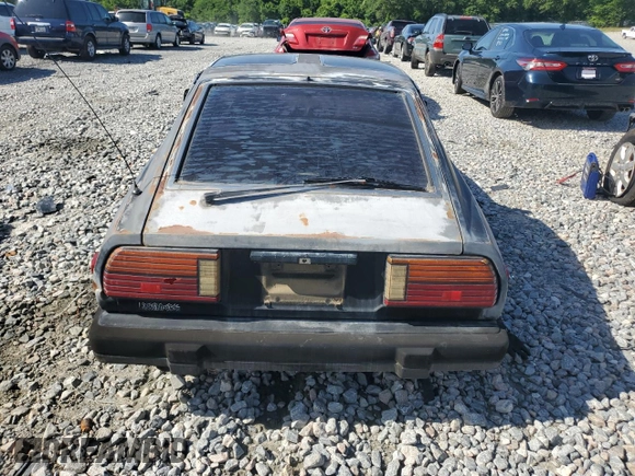 1982 Datsun 280ZX z VIN JN1HZ04S1CX447813, wystawiony jako Copart lot #56649125 z przebiegiem 285 290 mil mil oraz Tytuł czysty. Historia ofert i sprzedaży dostępna na DreamBid. Obrazek 6.
