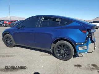 2023 Tesla Model Y Long Range z VIN 7SAYGDEE2PF908622, wystawiony jako Copart lot #47228145 z przebiegiem 10 639 mil mil oraz Szkoda całkowita • Salvage title. Historia ofert i sprzedaży dostępna na DreamBid. Obrazek 2.