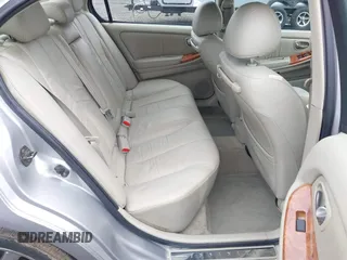 2002 Infiniti I35 Luxury with VIN JNKDA31A22T005398, listed as a IAAI auction lot 41818757 with 165,228 mi miles. Bid and sale history available at carsss.com. Image 8.