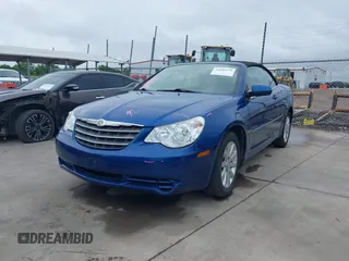 2010 Chrysler Sebring Touring with VIN 1C3BC5ED4AN147603, listed as a IAAI auction lot 41888976 with 83,800 mi miles and . Bid and sale history available at DreamBid. Image 2.