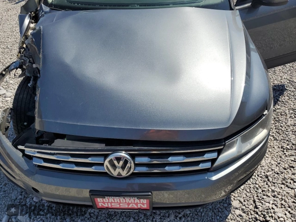 2018 Volkswagen Tiguan S with VIN 3VV0B7AX0JM111971, listed as a Copart auction lot 54485955 with 98,716 mi miles and Salvage Title. Bid and sale history available at DreamBid. Image 12.
