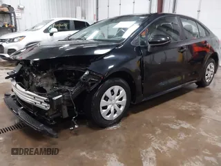 2021 Toyota Corolla L with VIN 5YFDPMAE5MP208692, listed as a IAAI auction lot 41472857 with 63,736 mi miles and . Bid and sale history available at DreamBid. Image 2.