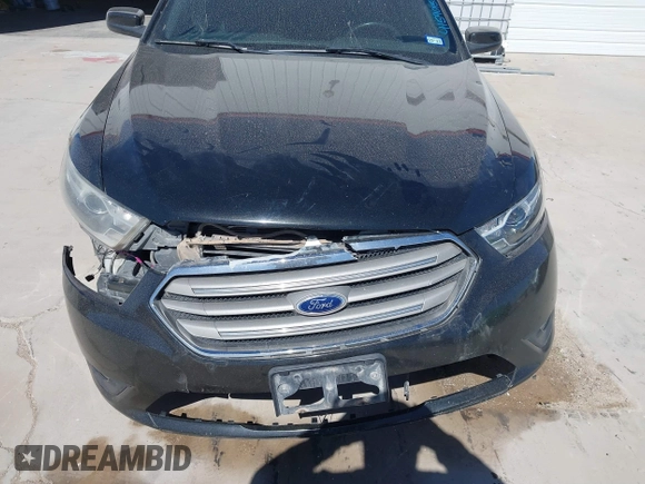 2014 Ford Taurus SEL with VIN 1FAHP2E83EG184976, listed as a IAAI auction lot 41590153 with 177,342 mi miles. Bid and sale history available at carsss.com. Image 6.