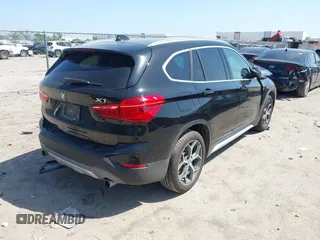 2017 BMW X1 sDrive28i z VIN WBXHU7C31H5H33748, wystawiony jako IAAI lot #42003198 z przebiegiem 71 274 mil mil oraz . Historia ofert i sprzedaży dostępna na DreamBid. Obrazek 4.