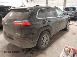 2014 Jeep Cherokee Latitude z VIN 1C4PJMCS0EW321380, wystawiony jako IAAI lot #41597508 z przebiegiem 173 991 mil mil oraz . Historia ofert i sprzedaży dostępna na DreamBid. Obrazek 4.
