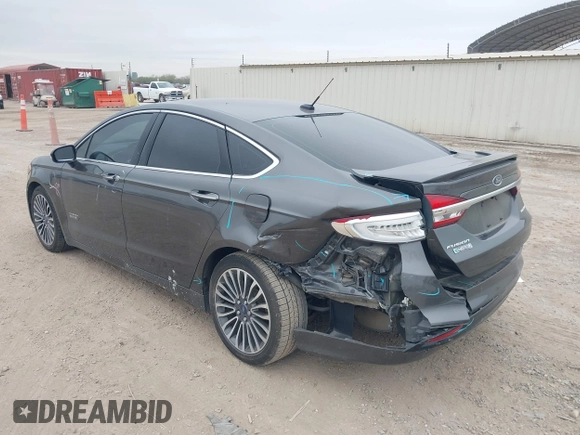 2017 Ford Fusion Titanium with VIN 3FA6P0SU8HR104727, listed as a IAAI auction lot 41242482 with 83,021 mi miles and . Bid and sale history available at DreamBid. Image 3.