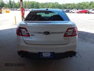 2015 Ford Taurus Limited z VIN 1FAHP2F89FG101017, wystawiony jako IAAI lot #42284459 z przebiegiem 183 167 mil mil oraz . Historia ofert i sprzedaży dostępna na DreamBid. Obrazek 16.