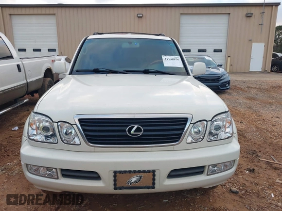 2000 Lexus LX 470 z VIN JT6HT00W9Y0103225, wystawiony jako IAAI lot #41148826 z przebiegiem 270 351 mil mil oraz . Historia ofert i sprzedaży dostępna na DreamBid. Obrazek 12.