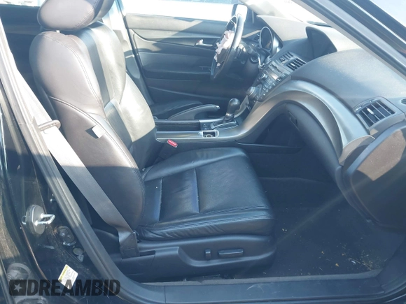 2012 Acura TL Tech Auto with VIN 19UUA8F50CA025948, listed as a IAAI auction lot 41723890 with 203,424 mi miles. Bid and sale history available at carsss.com. Image 5.