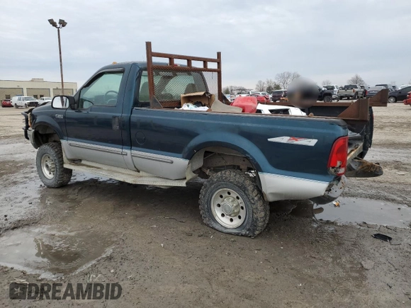 1999 Ford F-250 with VIN 1FTNF21S8XEA67992, listed as a Copart auction lot 44249795 with 157,528 mi miles and Salvage title. Bid and sale history available at DreamBid. Image 2.