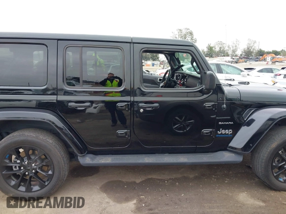 2023 Jeep Wrangler Sahara z VIN 1C4JJXP6XPW556327, wystawiony jako IAAI lot #41784532 z przebiegiem 39 918 mil mil oraz . Historia ofert i sprzedaży dostępna na DreamBid. Obrazek 13.
