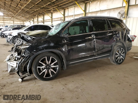 2021 Honda Pilot Touring 8-Passenger with VIN 5FNYF5H96MB007074, listed as a Copart auction lot 48806165 with Not Provided miles and Salvage Title. Bid and sale history available at DreamBid. Image 1.