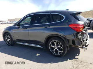 2017 BMW X1 xDrive28i with VIN WBXHT3C35H5F76415, listed as a Copart auction lot 48533495 with 66,448 mi miles and Salvage Title. Bid and sale history available at carsss.com. Image 2.