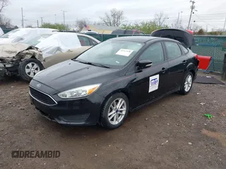 2016 Ford Focus SE with VIN 1FADP3F23GL280843, listed as a IAAI auction lot 41917538 with 125,392 mi miles. Bid and sale history available at carsss.com. Image 2.
