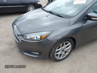 2015 Ford Focus SE with VIN 1FADP3K26FL269811, listed as a IAAI auction lot 42148333 with 157,192 mi miles. Bid and sale history available at carsss.com. Image 6.