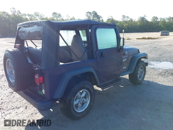 1998 Jeep Wrangler Sport with VIN 1J4FY19S8WP798559, listed as a IAAI auction lot 42162734 with 129,638 mi miles and . Bid and sale history available at DreamBid. Image 4.