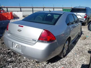 2014 Chevrolet Impala LT with VIN 2G1WB5E31E1184020, listed as a IAAI auction lot 41770355 with 135,367 mi miles and . Bid and sale history available at DreamBid. Image 4.