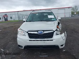 2014 Subaru Forester Premium with VIN JF2SJAECXEH517430, listed as a IAAI auction lot 42172879 with 129,369 mi miles and . Bid and sale history available at DreamBid. Image 12.