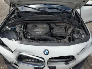 2018 BMW X2 xDrive28i z VIN WBXYJ5C38JEF79686, wystawiony jako Copart lot #56988735 z przebiegiem 103 799 mil mil oraz Szkoda całkowita • Salvage title. Historia ofert i sprzedaży dostępna na DreamBid. Obrazek 11.