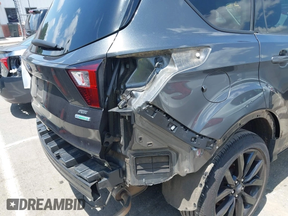 2019 Ford Escape SE z VIN 1FMCU0GD0KUB74569, wystawiony jako IAAI lot #42271476 z przebiegiem 66 335 mil mil oraz . Historia ofert i sprzedaży dostępna na DreamBid. Obrazek 18.