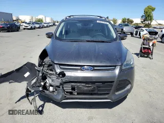 2015 Ford Escape Titanium with VIN 1FMCU9J99FUC13108, listed as a Copart auction lot 60815265 with 70,938 mi miles and Salvage title. Bid and sale history available at DreamBid. Image 5.