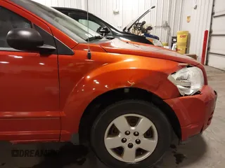 2008 Dodge Caliber SE with VIN 1B3HB28B48D634707, listed as a IAAI auction lot 41636023 with 149,652 mi miles and . Bid and sale history available at carsss.com. Image 6.