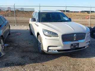 2021 Lincoln Aviator Reserve z VIN 5LM5J7XC5MGL02577, wystawiony jako IAAI lot #41944356 z przebiegiem 68 941 mil mil oraz . Historia ofert i sprzedaży dostępna na DreamBid. Obrazek 1.