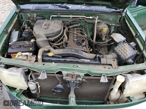 1998 Nissan Frontier XE with VIN 1N6DD21S8WC303274, listed as a Copart auction lot 79755584 with Not provided miles and Salvage title. Bid and sale history available at DreamBid. Image 11.