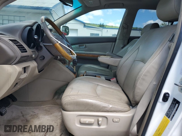 2009 Lexus RX 350 with VIN 2T2HK31U59C113330, listed as a Copart auction lot 56238105 with 176,469 mi miles and Clean Title. Bid and sale history available at DreamBid. Image 7.