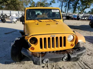 2012 Jeep Wrangler Rubicon with VIN 1C4BJWCG2CL135789, listed as a Copart auction lot 42556365 with 121,908 mi miles and Salvage title. Bid and sale history available at DreamBid. Image 5.