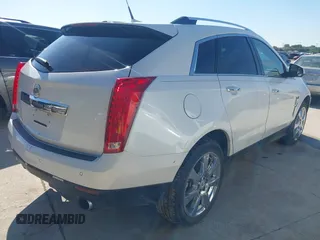 2011 Cadillac SRX Premium Collection z VIN 3GYFNCEYXBS579760, wystawiony jako IAAI lot #42238707 z przebiegiem Nie podano mil oraz . Historia ofert i sprzedaży dostępna na DreamBid. Obrazek 4.