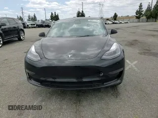 2023 Tesla Model 3 z VIN 5YJ3E1EA7PF600239, wystawiony jako Copart lot #56557705 z przebiegiem 18 851 mil mil oraz Szkoda całkowita • Salvage title. Historia ofert i sprzedaży dostępna na DreamBid. Obrazek 14.