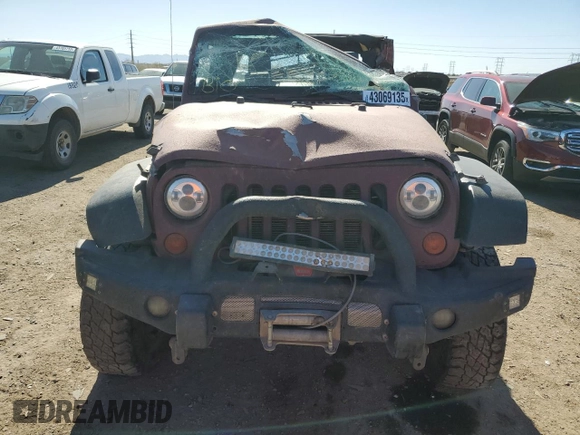 2008 Jeep Wrangler Unlimited Rubicon with VIN 1J8GA69108L587684, listed as a Copart auction lot 43069135 with 99,620 mi miles and Salvage Title. Bid and sale history available at carsss.com. Image 5.