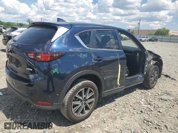 2018 Mazda CX-5 Touring with VIN JM3KFBCMXJ0460020, listed as a Copart auction lot 55997305 with 56,361 mi miles and Salvage Title. Bid and sale history available at DreamBid. Image 3.