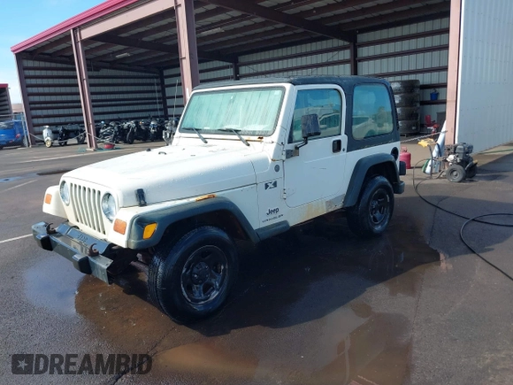 2004 Jeep Wrangler X z VIN 1J4FA39S04P747828, wystawiony jako IAAI lot #41484240 z przebiegiem Nie podano mil oraz . Historia ofert i sprzedaży dostępna na DreamBid. Obrazek 18.