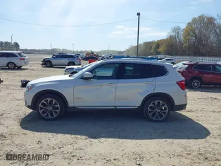 2015 BMW X3 xDrive28i with VIN 5UXWX9C58F0D53436, listed as a IAAI auction lot 41878069 with 143,587 mi miles. Bid and sale history available at carsss.com. Image 14.