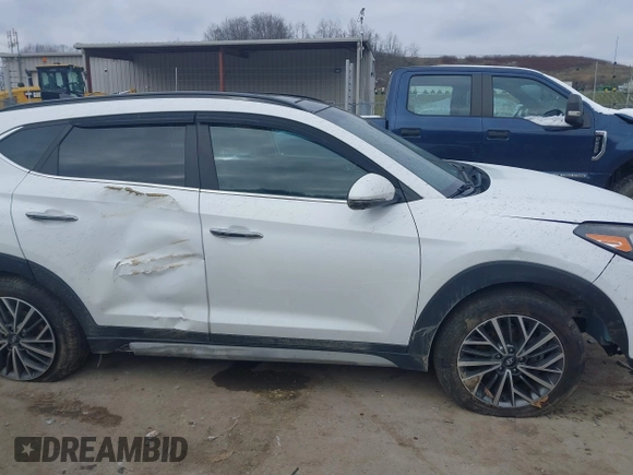 2019 Hyundai Tucson Ultimate with VIN KM8J3CALXKU016834, listed as a IAAI auction lot 40970606 with 104,208 mi miles. Bid and sale history available at carsss.com. Image 13.