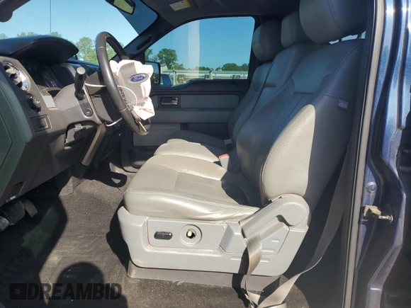 2014 Ford F-150 XL with VIN 1FTFW1ETXEKD01260, listed as a Copart auction lot 55203685 with 153,410 mi miles and Salvage title. Bid and sale history available at DreamBid. Image 7.