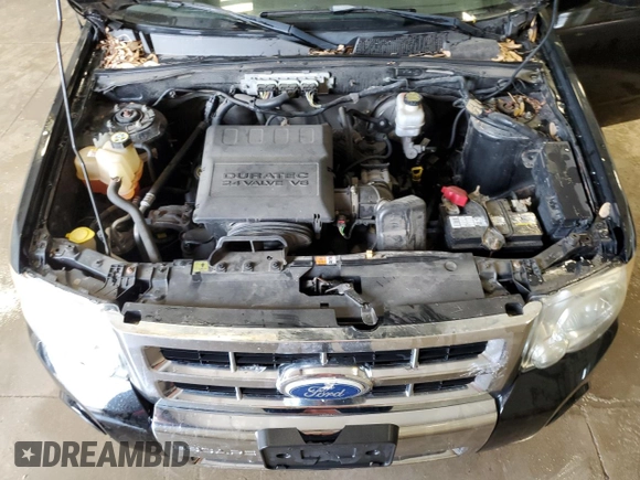 2010 Ford Escape Limited with VIN 1FMCU9EG3AKC87458, listed as a Copart auction lot 59057165 with 110,611 mi miles and Non repairable. Bid and sale history available at DreamBid. Image 12.