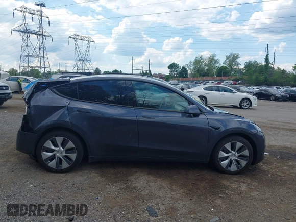 2021 Tesla Model Y Long Range z VIN 5YJYGDEE6MF070068, wystawiony jako IAAI lot #42224634 z przebiegiem 33 850 mil mil oraz . Historia ofert i sprzedaży dostępna na DreamBid. Obrazek 13.
