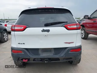 2015 Jeep Cherokee Trailhawk with VIN 1C4PJMBS9FW623740, listed as a IAAI auction lot 42131019 with 155,105 mi miles and . Bid and sale history available at DreamBid. Image 16.