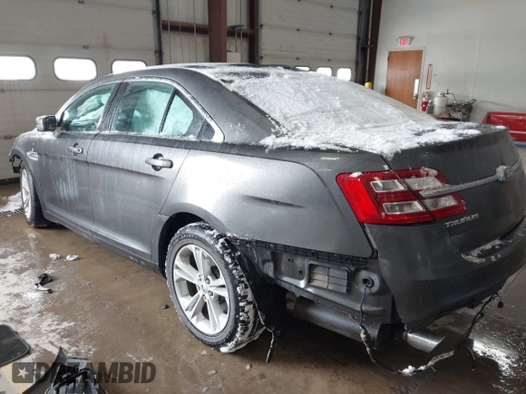 2015 Ford Taurus SEL with VIN 1FAHP2E89FG202589, listed as a IAAI auction lot 41592298 with 105,410 mi miles and . Bid and sale history available at carsss.com. Image 3.