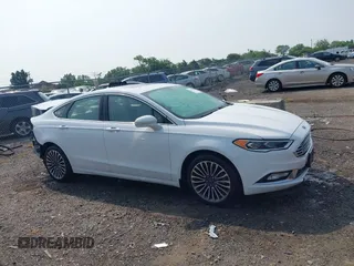 2018 Ford Fusion Titanium with VIN 3FA6P0D97JR247621, listed as a IAAI auction lot 42465608 with 174,983 mi miles and . Bid and sale history available at DreamBid. Image 14.