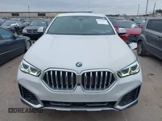 2020 BMW X6 xDrive40i z VIN 5UXCY6C09L9C52142, wystawiony jako IAAI lot #41593337 z przebiegiem 61 892 mil mil oraz . Historia ofert i sprzedaży dostępna na DreamBid. Obrazek 12.