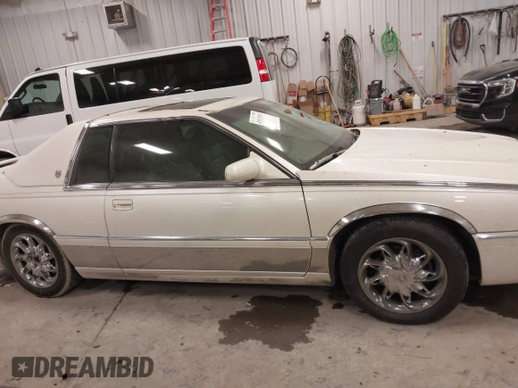 2002 Cadillac Eldorado ESC with VIN 1G6EL12Y82B102890, listed as a IAAI auction lot 41511915 with 79,116 mi miles. Bid and sale history available at carsss.com. Image 13.