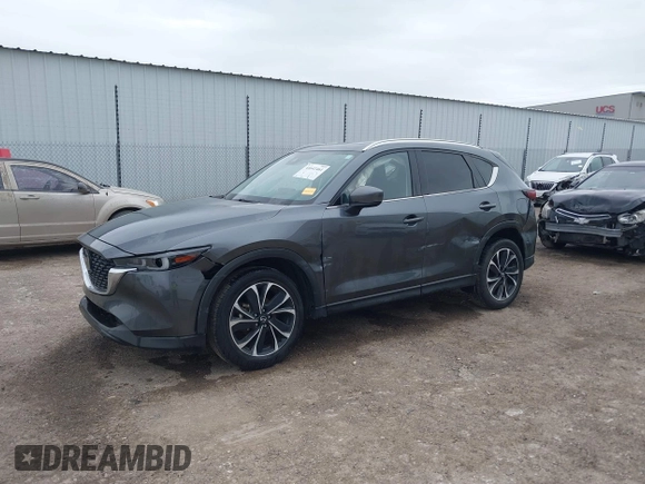 2023 Mazda CX-5 2.5 S Premium Plus Package with VIN JM3KFBEM2P0163054, listed as a IAAI auction lot 41642461 with 18,508 mi miles. Bid and sale history available at carsss.com. Image 2.